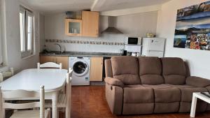 A kitchen or kitchenette at Apartamentos San Guillermo