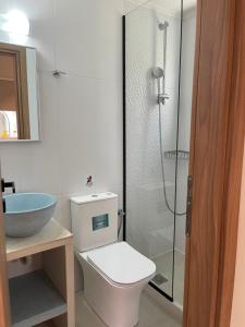 Kúpeľňa v ubytovaní Psaras Apartments