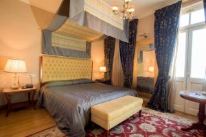 Postel nebo postele na pokoji v ubytování Grande Bretagne - Nafplio