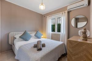 Postel nebo postele na pokoji v ubytování 17 Vistamar Playa Flamenca + 51 fotografií