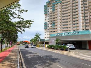 a street in front of a large building at Enjoy Olimpia Park Resort in Olímpia