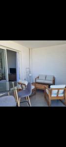 Posezení v ubytování Ti Kaz Vacances T2 vue mer