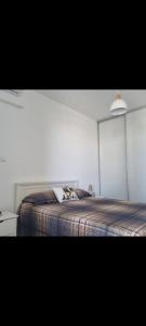 Postel nebo postele na pokoji v ubytování Ti Kaz Vacances T2 vue mer