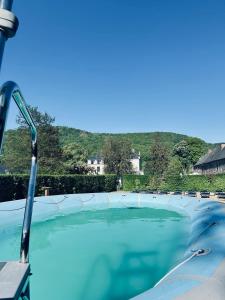 a close up of a swimming pool at Tournesol Gîte Charmant en Pleine Nature pour 6 Personnes in Vireux-Wallerand
