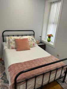 Ένα ή περισσότερα κρεβάτια σε δωμάτιο στο Simple Elegant Living