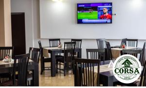 Et logo, certifikat, skilt eller en pris der bliver vist frem på Hotel Restaurant Corsa + 32 billeder