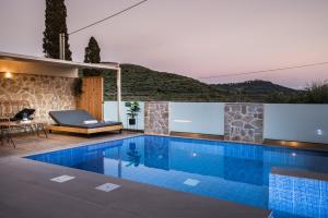 a swimming pool in a villa with a view at Zante way villas in Zakynthos