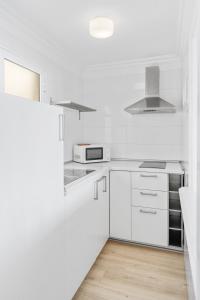 Una cocina o zona de cocina en Apartamentos Bruja