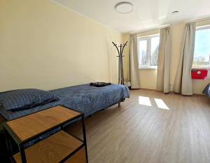 Postel nebo postele na pokoji v ubytování Meierei kohviku majutus
