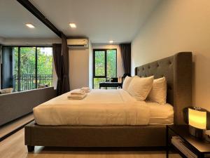 Voodi või voodid majutusasutuse Contemporary Downtown - Ultra Fast WiFi - BTS Asoke toas +67 fotot