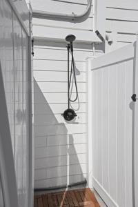 a door with a hanger on the side of a house at Beach House with Heated Pool & Family Games in Palm Coast