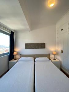 Cama o camas de una habitación en Apartamentos Bruja