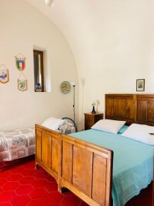 Postel nebo postele na pokoji v ubytování Casa Colonica