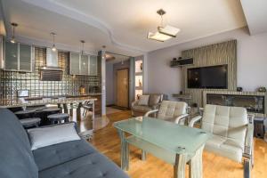 Posedenie v ubytovaní Prestige Apartamenty Stara Polana & SPA2