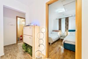 Giường trong phòng chung tại Central Green apartment 3BD - Free Private Parking - by Open House