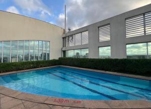 Bazén v ubytování Hotel Ibirapuera Moema UH2003 nebo v jeho okolí