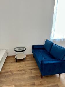 Posezení v ubytování La Suite Blue
