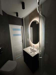 Et badeværelse på Nowoczesny Apartament Centrum przy PKP