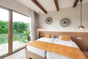 Postel nebo postele na pokoji v ubytování Hiša Marija House + 37 fotografií