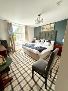 Ένα ή περισσότερα κρεβάτια σε δωμάτιο στο Ratcliffe Room