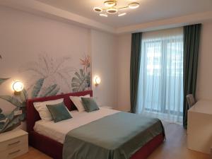 En eller flere senge i et værelse på Teona 109 in Axxis Nova