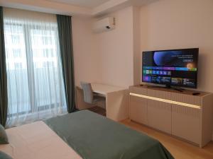 Et tv og/eller underholdning på Teona 109 in Axxis Nova + 26 billeder