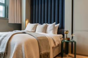 Unity Hammarby Sjöstad - A Studio Hotel客房内的一张或多张床位