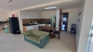 En eller flere senge i et værelse på Casa de praia em Itaúna, Saquarema, Pertinho do mar 150 m da areia com 3 quartos e ar condicionado + 34 billeder