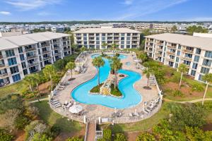 an aerial view of a pool at a resort at HP 16E Beach Treat by 30A Escapes in Rosemary Beach