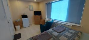 Μια τηλεόραση ή/και κέντρο ψυχαγωγίας στο Romford Lodge +24 φωτογραφίες