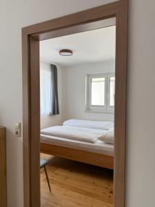 Łóżko lub łóżka w pokoju w obiekcie Appartement Berger
