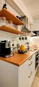 Kuchyň nebo kuchyňský kout v ubytování Lemon Tree Apartment