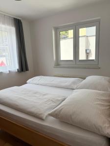Łóżko lub łóżka w pokoju w obiekcie Appartement Berger