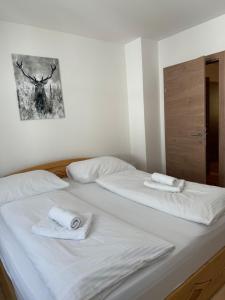 Łóżko lub łóżka w pokoju w obiekcie Appartement Berger