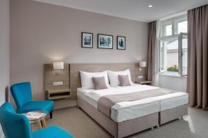 Posteľ alebo postele v izbe v ubytovaní Hotel Florenc