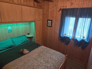 Voodi või voodid majutusasutuse Ciapin House toas