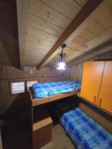 Voodi või voodid majutusasutuse Ciapin House toas