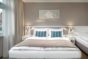 Posteľ alebo postele v izbe v ubytovaní Hotel Florenc