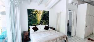 A bed or beds in a room at Casa Sabina