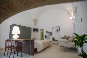 TV a/nebo společenská místnost v ubytování Corte Campanile Boutique B&B