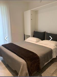 Postel nebo postele na pokoji v ubytování B&B Relax Rooms - Villa Murari Brà