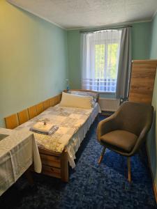 Voodi või voodid majutusasutuse Guest House Pod Lesem Merklín toas