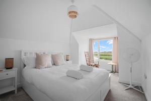Postel nebo postele na pokoji v ubytování Bay View Luxury Stays - Southdown