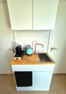 Kuchyň nebo kuchyňský kout v ubytování Welkom op Texel, kamer met balkon