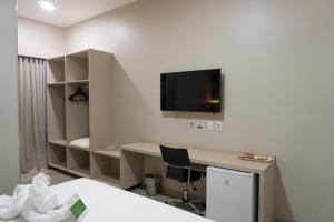 TV a/nebo společenská místnost v ubytování Hotel Mandino