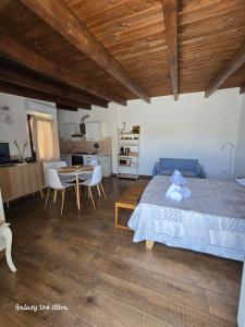 Ένα ή περισσότερα κρεβάτια σε δωμάτιο στο Cecilia's House Cagliari Centro