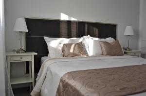 Ένα ή περισσότερα κρεβάτια σε δωμάτιο στο Ático vista mar con terraza