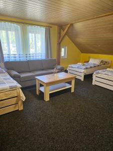 Voodi või voodid majutusasutuse Guest House Pod Lesem Merklín toas