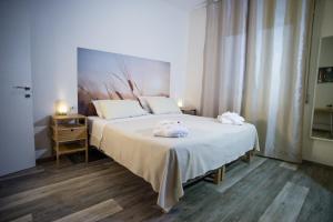 Postel nebo postele na pokoji v ubytování B&B Hill Ranch + 8 fotografií
