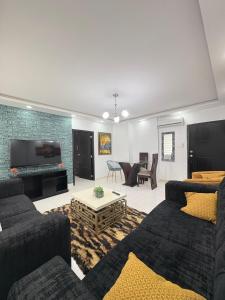 TV a/nebo společenská místnost v ubytování Hotel Monaco